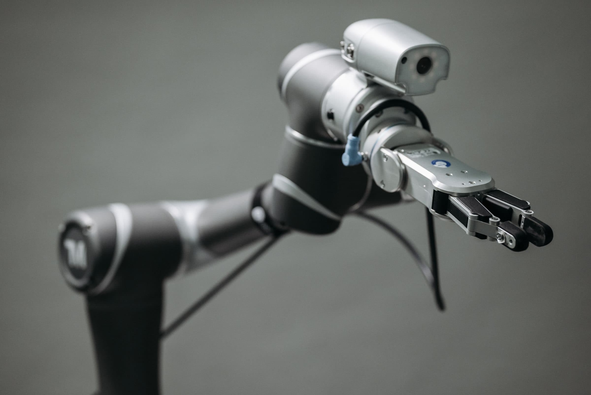 Precision robotic arm gripper